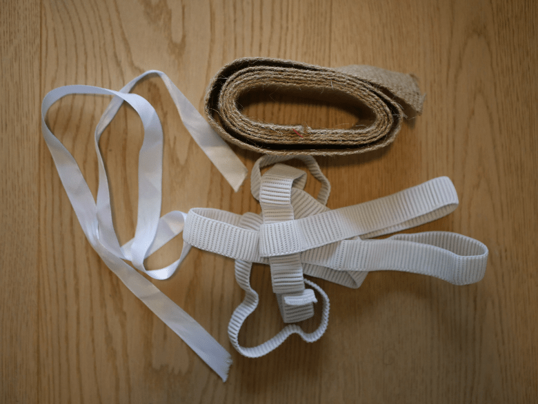 A variety of string, fabric, twine or elastic to tie your bug hotel together.