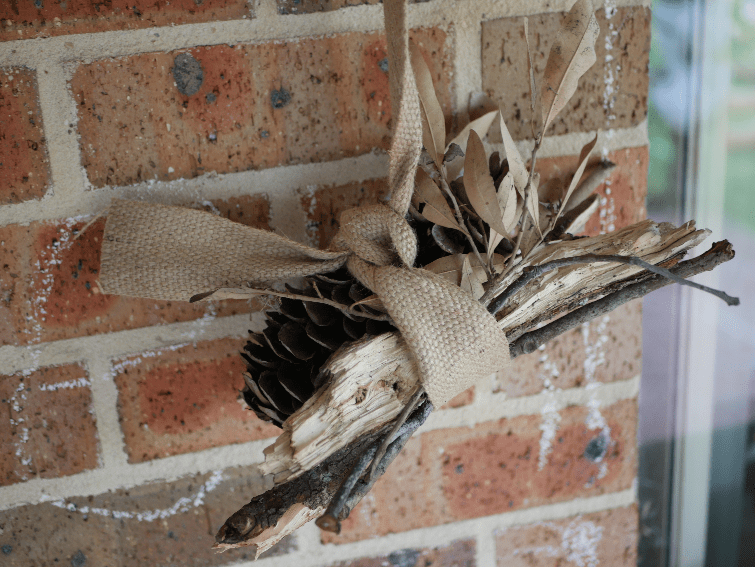 A complete bug hotel, tied together and hung outside for bugs to enjoy!
